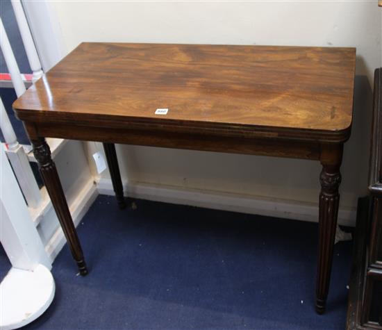 A Regency brass strung rosewood card table, W.3ft 1.5in. D.1ft 6.5in. H.2ft 5in.